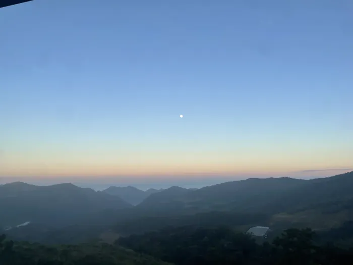 Star at dawn over the northern Thai mountains